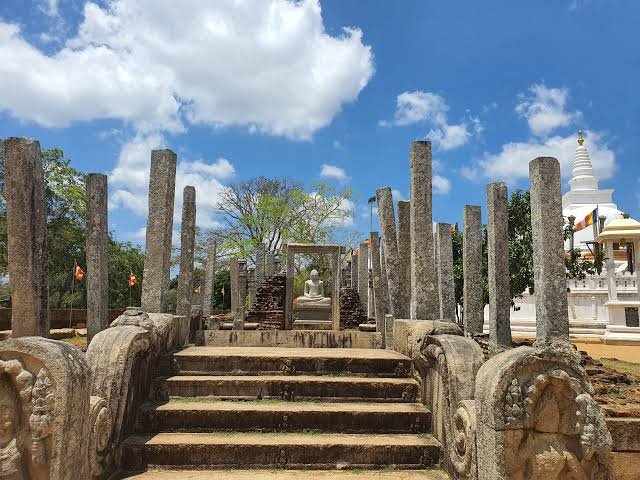 Stone pillars and steps at an ancient site in Anuradhapura