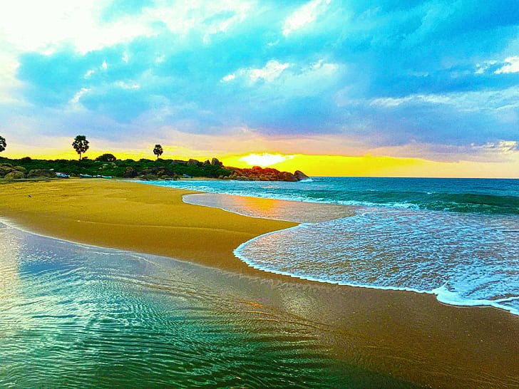 Sunset over the beach at Arugam Bay
