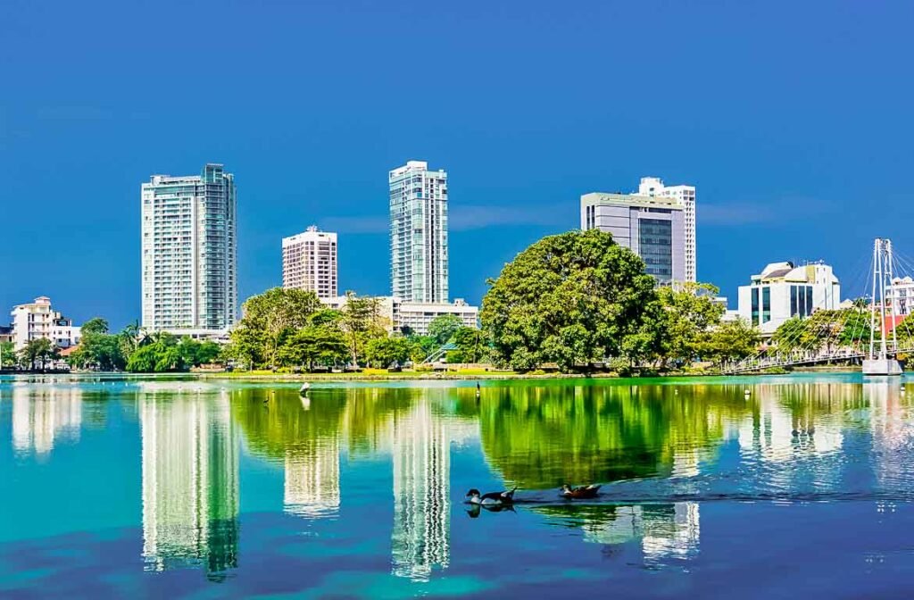 Colombo city skyline reflected in Beira Lake
