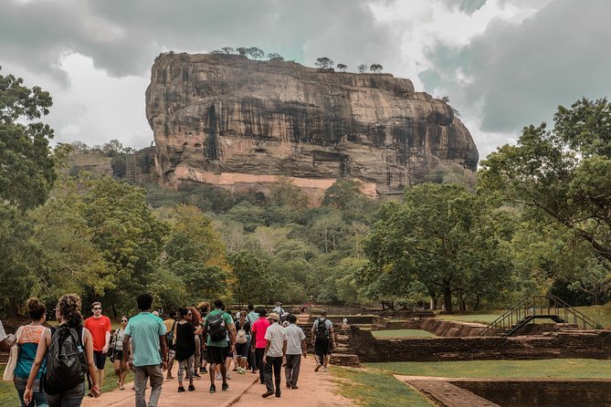 Visitors walking to Sigiriya Rock through the gardens